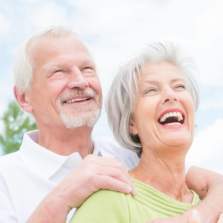 Senior Couple Looking at Sky - Laughing and in Love